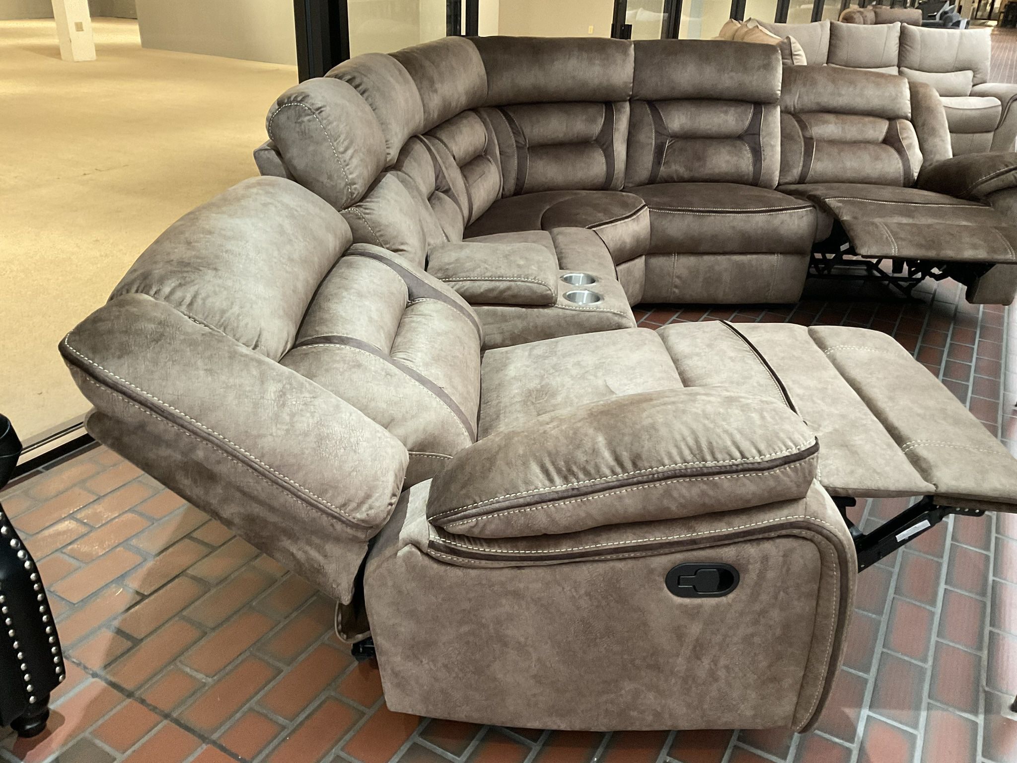 New sectional sofa manual recliner suede fabric by Kathy Ireland.