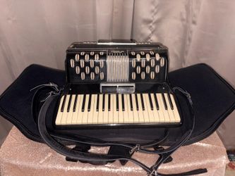 Your's Today Selling or Trading if ad cash back for a Ancona by Soprani Piano Accordion with Case for a Bargain!