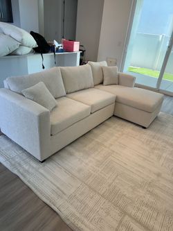 Brand new cream sectionals in stock