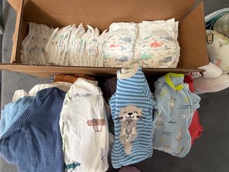 $25 BOX FULL CLOTHES & DIAPERS( size3)+Car Accessories