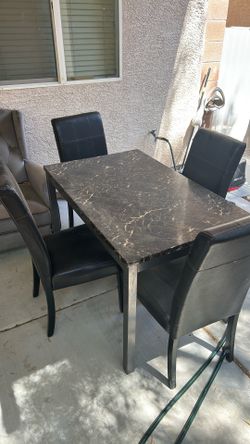 Table and four chairs