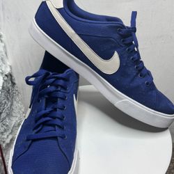 These are men's Nike Court Legacy Canvas sneakers in blue.