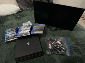 PS4 pro w/ monitor and games