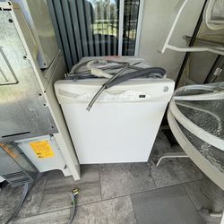 Electric Range , Microwave And Dishwasher 