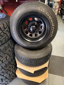Brand new wheels with used tires 215-65-15 $750 wheels and tires wheels are 15x10 5x4.75 offset -25