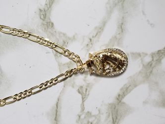 Gold chain with charm