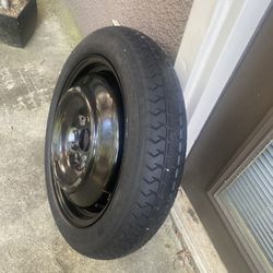 Spare tire with rim inflate to 420 kpa (60Q psi)