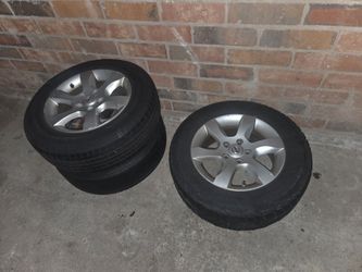 3 nissan rims an tires