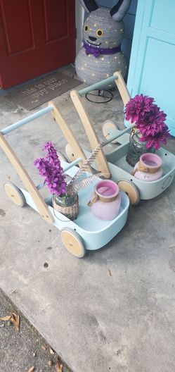 Two decorative push wagons