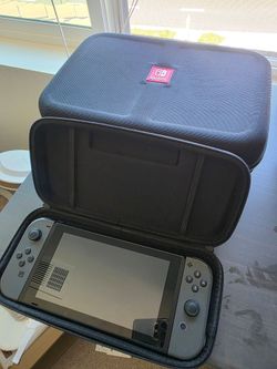 Nintendo Switch Console with travel case