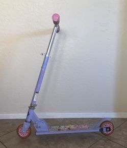 Girl’s purple princess scooter