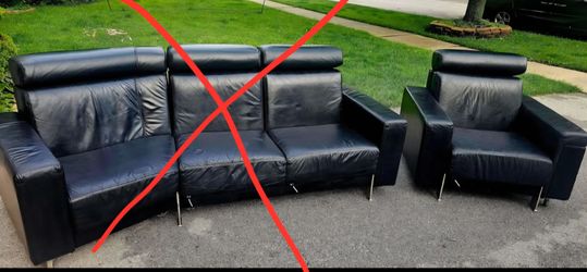 Leather Armchair / recliner with foot rest - couch is sold