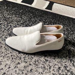 white and black loafers 