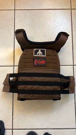Never used Brand new 5.11 vest with refillable 5.11 sand weights