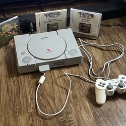 PlayStation 1 with games controller and cords. Fully Tested & works