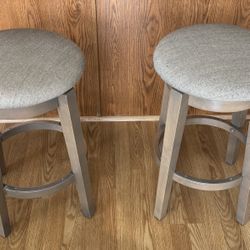 2 Counter Height Swivel Stools 