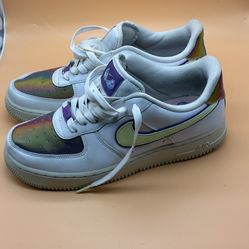 Nike Air Force 1 Low Colorway: White with iridescent (holographic) panels and purple accents Size: US 8.5 Condition: Used