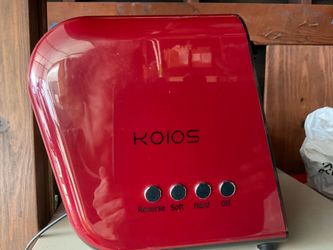 Koios juicer with revers, soft, hard and off settings.