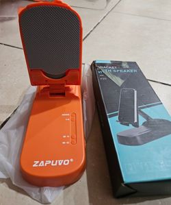 ell Phone Stand with Wireless Bluetooth Speaker,

