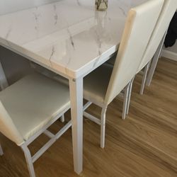 Table With Four Chairs Basically New