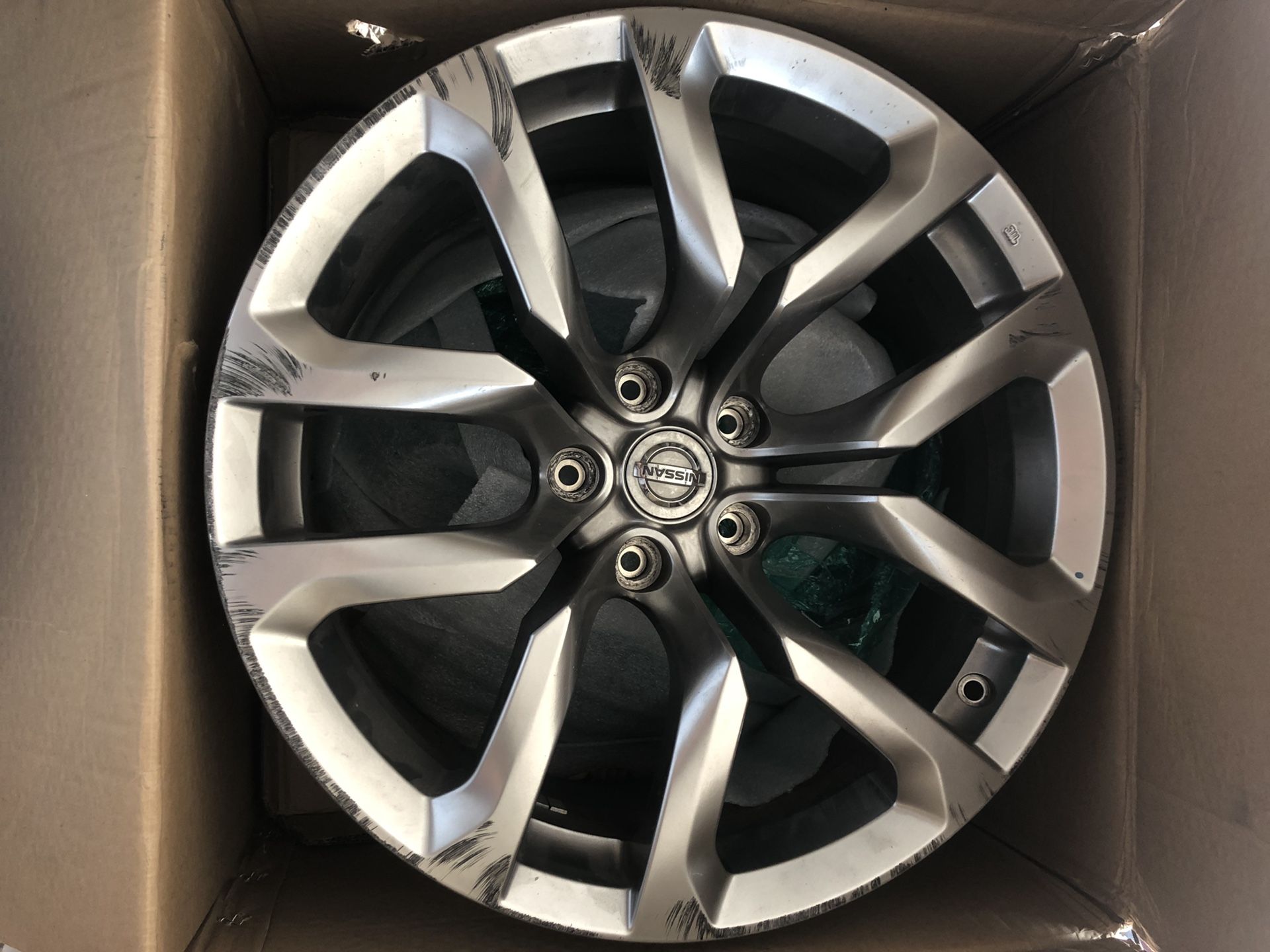 2010-2014 Nissan 370Z Rear Wheel 18x9 hyper silver. Straight with lots of curb rash