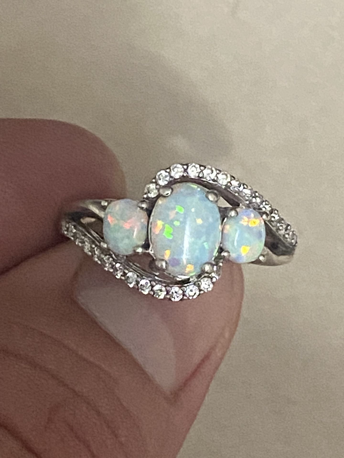 Vintage fire opal ring in fine retro ring, sterling silver number 925, size 61/2 asking $45, firm price.