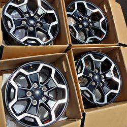 2023 JEEP GLADIATOR RIMS NEW BLACK OEM.....( 4 RIMS  )
