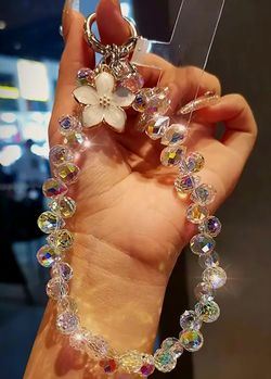 Elegant Iridescent Crystal Flower Phone Wristlet