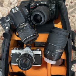 Nikon and Olympus cameras and lens and gear
