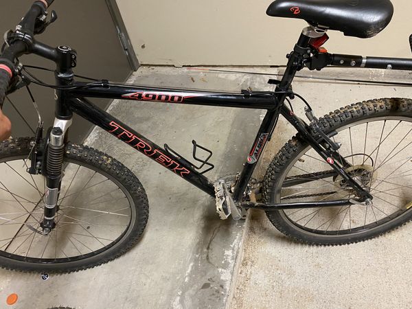 Trek 4900 mountain bike with trailer for Sale in Flower