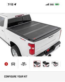Gater tri-fold hard cover with Chevy OEM front and rear weather-teck floor mats.