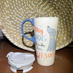 A Cypress home coffee mug with fitted top