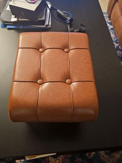 BRAND NEW BROWN LEATHER STOOL VERY STURDY AND COMFORTABLE ON YOUR FEET