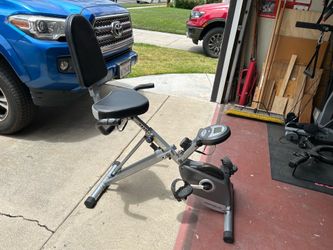 Compact, recumbent cycling machine