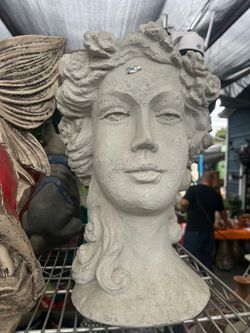 Women head plantes home decor made of cement $40.00 each