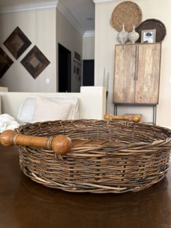 Large Round tray featuring wooden slat details and sturdy handles for serving or decoration