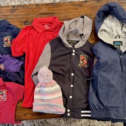 Doral Academy School Uniforms Great condition Short and long sleeve  2  Long Sleeve Shirts one Red one Navy  1 skirt size 6 Size 7/8,