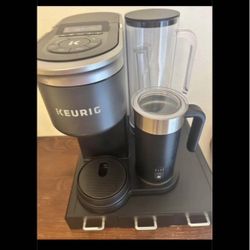 Like new keurig coffee maker WiFi, and coffee pod container incl