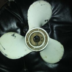 Johnson Evinrude 40 HP Propeller. I'm not sure about pitch, etc. See pics
