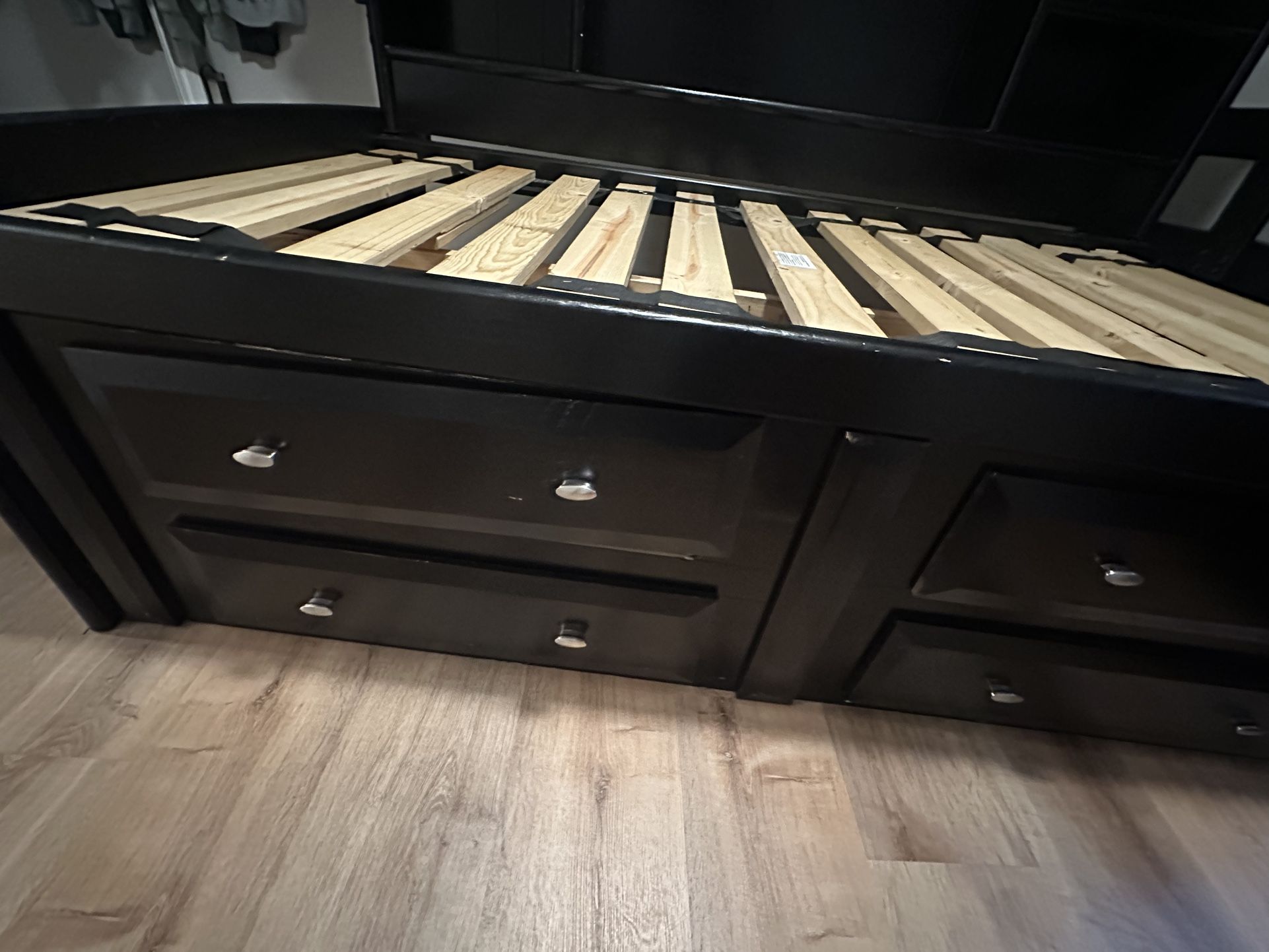 Twin Bed With 4 Side Drawers Plus Under storage And A Side Book Case.