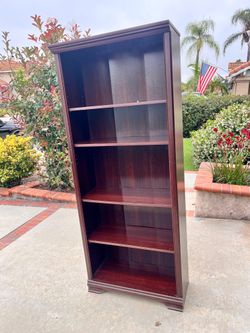 Tall Brown Book Case