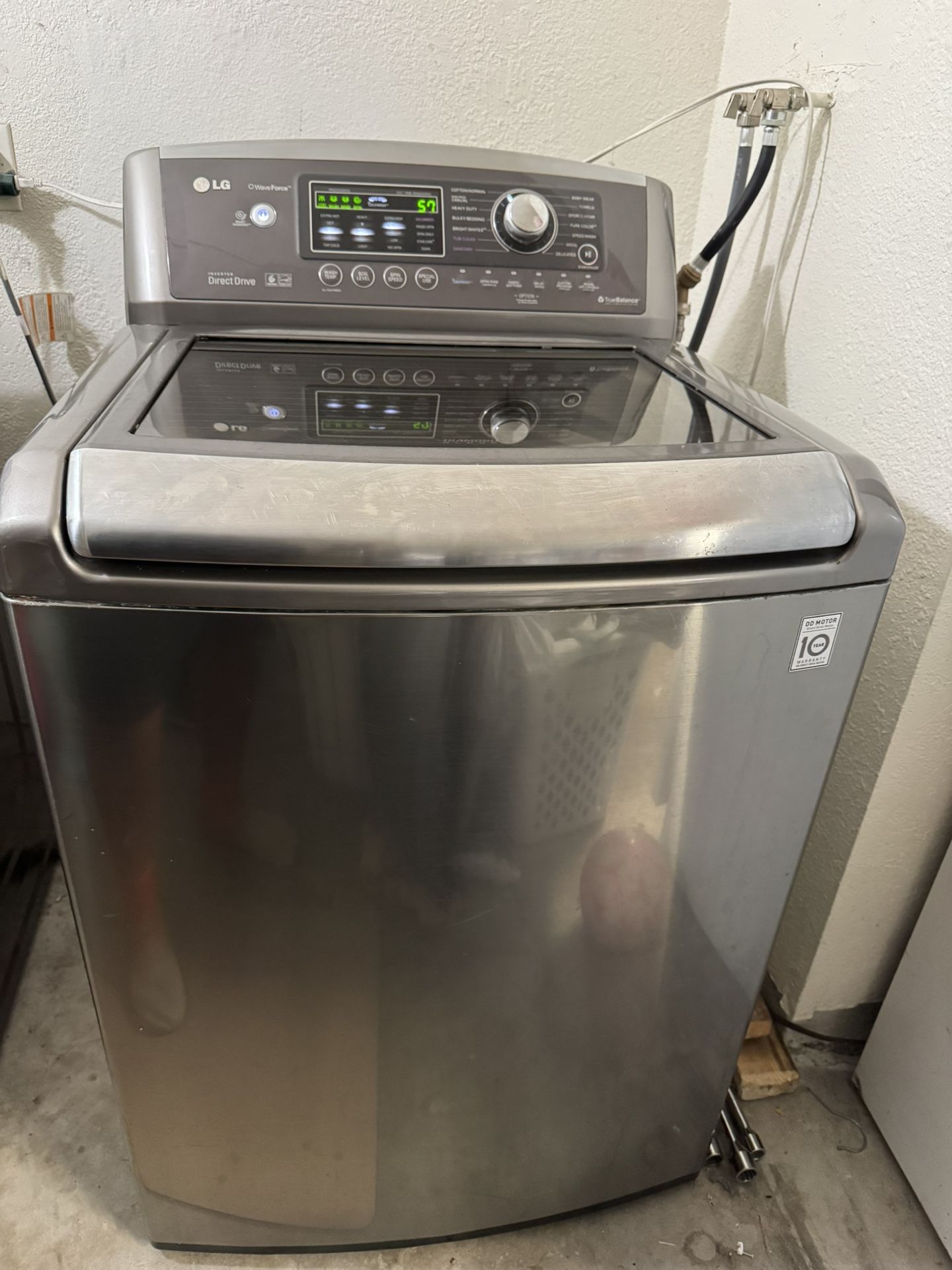 Washer - LG 4.7 cu. ft. Ultra Large Capacity High Efficiency Top Load Wash with Wave force