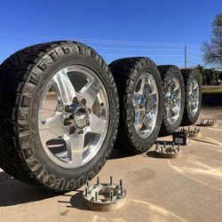 Chevy 2500HD Stock Rims With nitto tires-spacers-lugs