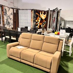 Brand New Reclining Sofa. 