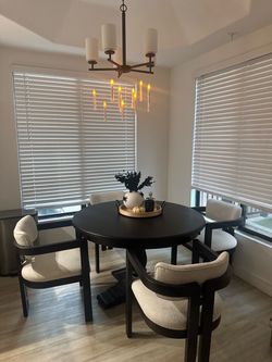 Black Round Dining Table + 4 Cream Upholstered Chairs