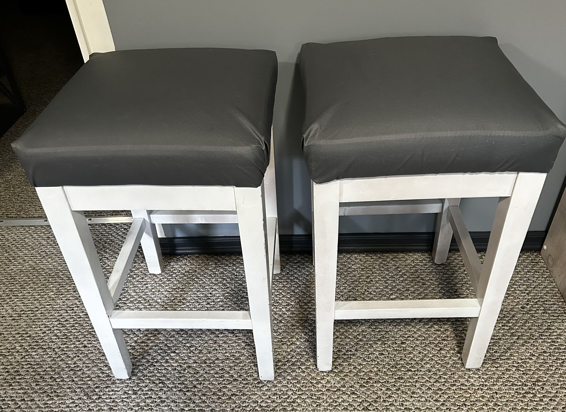 A Pair Of 26”H Heavily Padded, Gray, And White Wood Barstools