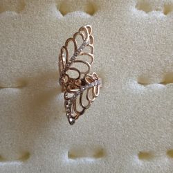 Double leaf gold tone ring, expandable back