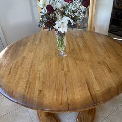 Nice looking round wood dining table