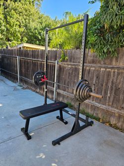 CAP Barbell 2-Inch Olympic Cast Iron Plate Weight Set 255 lbs  CAP Power Rack Exercise Stand Marcy Bench and 7ft Bar OBO