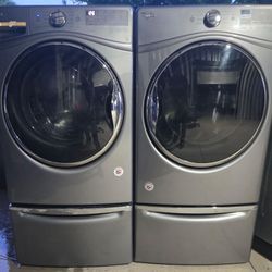 Whirlpool Stainless Front Loading Laundry Pair On Pedestals 